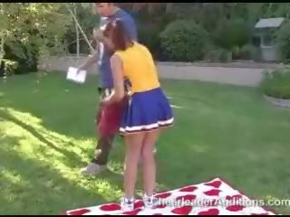 Delightful fascinating redhead cheerleader showing tits