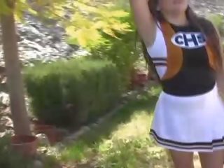 Michelle sensational brunette cheerleader cookie flashing tits and ass and pussy