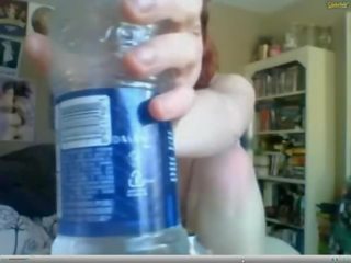 Teen with ginger hair water bottle insertion -01