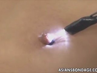 Asian cutie bond and fuckd by a fucking machine