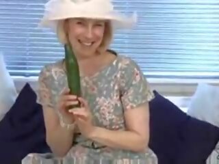 Mature housewife fucks a cucumber